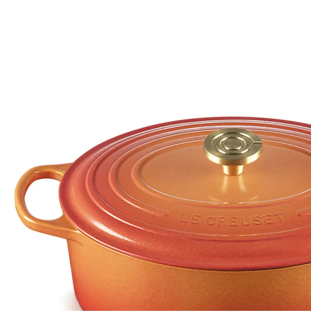 Panela Le Creuset Oval Signature Flamme Dorée com Pegador Dourado 6,3L 31cm
