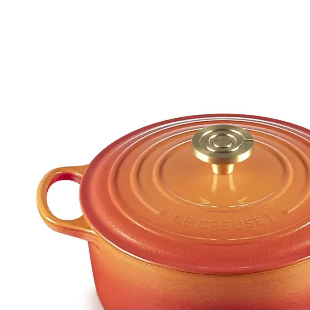 Panela Le Creuset Redonda Signature Flamme Dorée com Pegador Dourado 4,2L 24cm